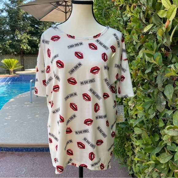 Lularoe women oversized shirt New With Tags size XXSmall super soft material - Picture 1 of 6